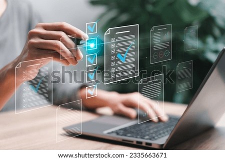 Document management concept, Businesswomen check electronic documents on digital documents on virtual screen Document Management System and process automation to efficiently document paperless operate Royalty-Free Stock Photo #2335663671