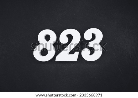 Black for the background. The number 837 is made of white painted wood.