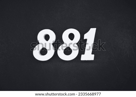 Black for the background. The number 881 is made of white painted wood.