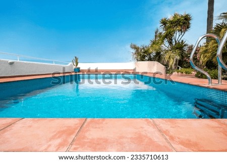 Terracotta tile closeup, tiled terrace with pool background Royalty-Free Stock Photo #2335710613