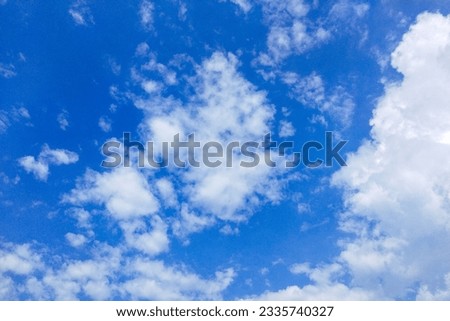 
Clear blue sky background. Sunny blue sky with white cloud.