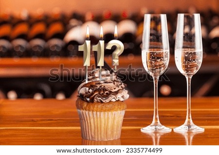 Cupcake With Number For Celebration Of Birthday Or Anniversary; Number 11 And Question Mark.