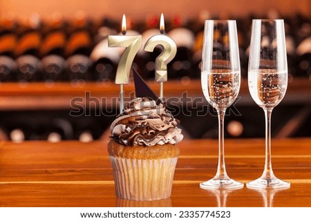 Cupcake With Number For Celebration Of Birthday Or Anniversary; Number 7 And Question Mark.