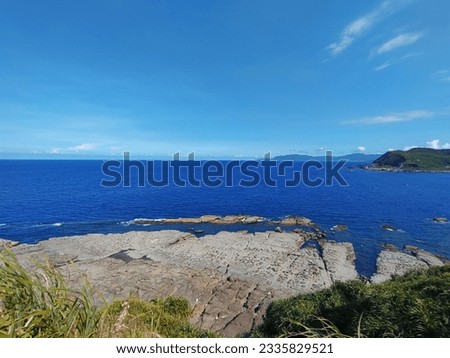 The view of the Bitou Cape with cliff and  wave-cut platform on the coast in New Taipei City in Taiwan Royalty-Free Stock Photo #2335829521
