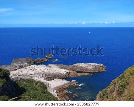The view of the Bitou Cape with cliff and  wave-cut platform on the coast in New Taipei City in Taiwan Royalty-Free Stock Photo #2335829779