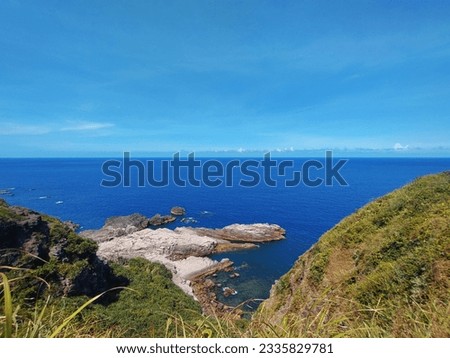 The view of the Bitou Cape with cliff and  wave-cut platform on the coast in New Taipei City in Taiwan Royalty-Free Stock Photo #2335829781