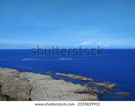 The view of the Bitou Cape with cliff and  wave-cut platform on the coast in New Taipei City in Taiwan Royalty-Free Stock Photo #2335829931