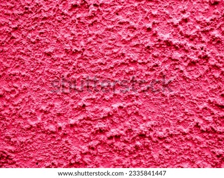 red wall with a rough surface