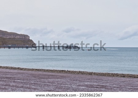 view of faraway pier in llandudno great britain