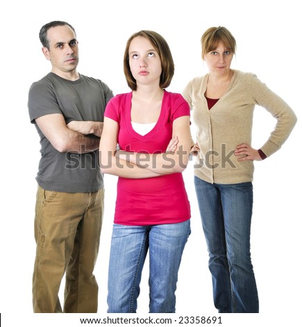 Teenage girl rolling her eyes in front of angry parents