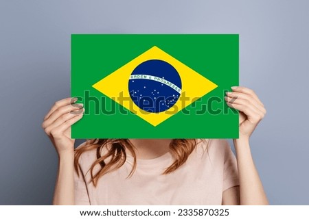 woman holds blank white speech bubble with brazil flag. National symbol of the country. 7th of September, Happy Day concept