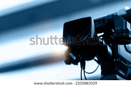 Detail of camera recording at a press conference
 Royalty-Free Stock Photo #2335883329