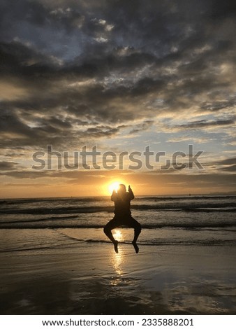 image of a person's shadow on the beach, stylized