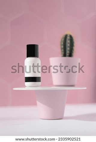 Facial skin care, moisturizer concept. Fashionable and Elegant beauty product on a podium display with pink background. Minimalist photography. Creative Skincare product photography.