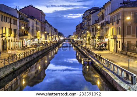 Naviglio Grande canal in the evening, Milan, Italy Royalty-Free Stock Photo #233591092