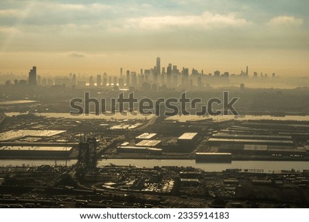 Foggy early morning panorama of New York and New Jersey from plane landing at Newark airport