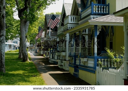 Beautiful colorful gingerbread houses, cottages in Oak Bluffs center, Martha's Vineyard island in Massachusetts USA on a sunny summer day Royalty-Free Stock Photo #2335931785