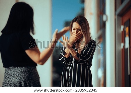 

Woman Crying Fighting with Her Best Friend Outdoors. Unhappy emotional girl disagreeing with her sister 
 Royalty-Free Stock Photo #2335952345