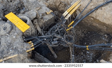 Accidentally destroyed underground telephone cables at the construction site in Belgrade. Royalty-Free Stock Photo #2335952557