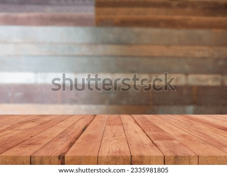 perspective wooden board over blurred wood background