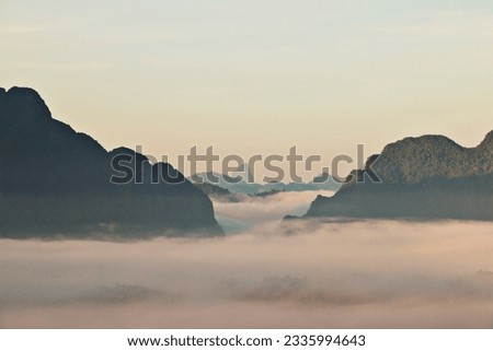 Mist and scenic view surrounding, from pha ngern view point, the mountain in vang vieng, laos