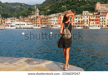 Tourist woman in Portofino old town, Liguria, Italy. Summer travel Royalty-Free Stock Photo #2336039247