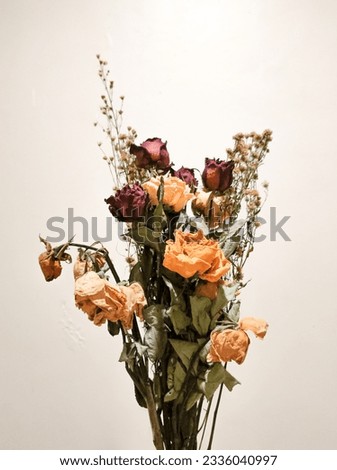 Beautyfull bucket of wilted flower  Royalty-Free Stock Photo #2336040997