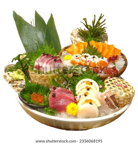 Salmon Sashimi set with fresh wasabi adding red seawood and green shi so and yellow flower Royalty-Free Stock Photo #2336068195