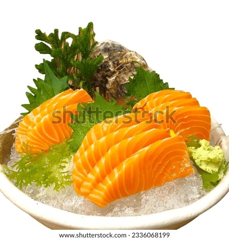 Salmon Sashimi set with fresh wasabi adding red seawood and green shi so and yellow flower Royalty-Free Stock Photo #2336068199