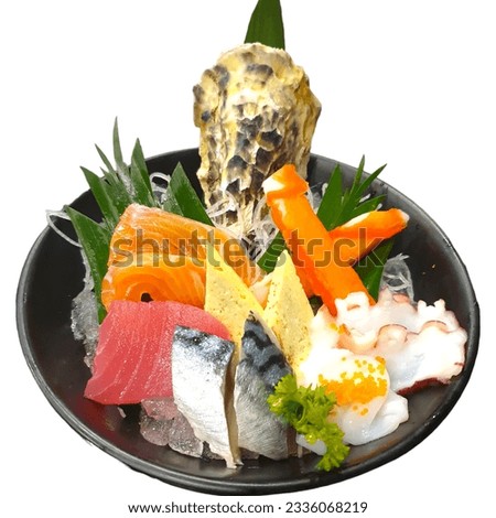 Salmon Sashimi set with fresh wasabi adding red seawood and green shi so and yellow flower Royalty-Free Stock Photo #2336068219