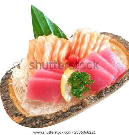 Salmon Sashimi set with fresh wasabi adding red seawood and green shi so and yellow flower Royalty-Free Stock Photo #2336068221