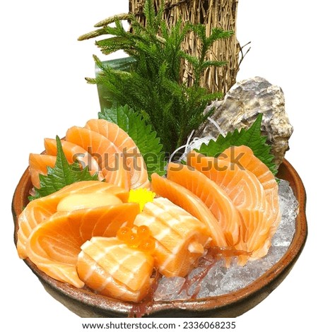 Salmon Sashimi set with fresh wasabi adding red seawood and green shi so and yellow flower Royalty-Free Stock Photo #2336068235