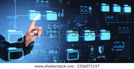 Businesswoman finger touching virtual screen with document management system, files archive and digital dashboard with statistics and data security. Concept of online database and research
