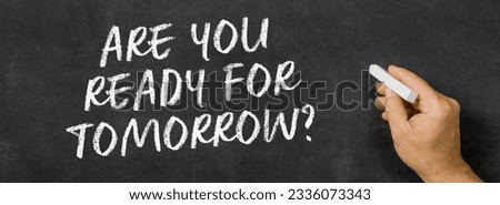  Text written on a blackboard -  Are you ready for tomorrow Royalty-Free Stock Photo #2336073343