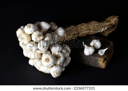 Bunch group of garlic on Black Background