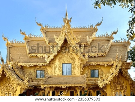 a temple with gold decorations on it