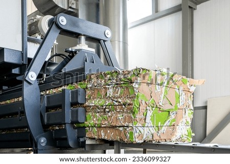 paper recycling truck and forklift loading old papers reuse Royalty-Free Stock Photo #2336099327