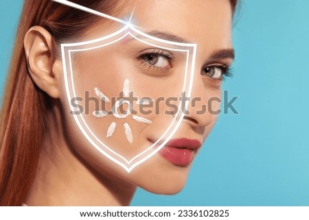 Sun protection care. Beautiful woman with sunscreen on face against light blue background, space for text. Illustration of shield as SPF Royalty-Free Stock Photo #2336102825