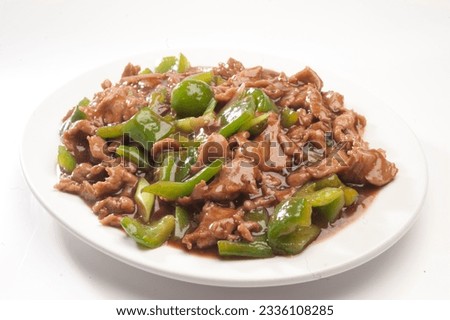 Beef green pepper. Is a popular Chinese-Japanese delicacy all over Japanese. Arabic, Chinese cuisine pictures, isolated on White background.
