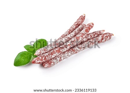 Air dried pork salami sticks, isolated on white background Royalty-Free Stock Photo #2336119133