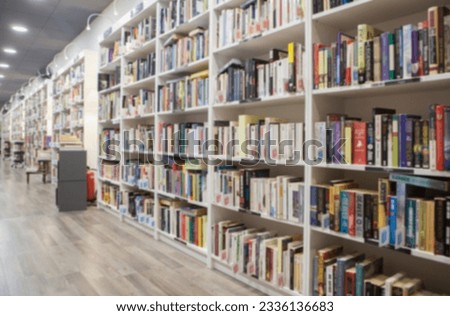 Second hand bookshop background. Out of focus Royalty-Free Stock Photo #2336136683