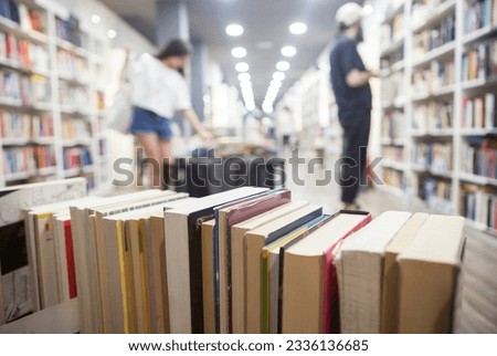 Second hand bookshop background. Selective focus