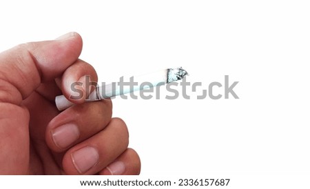 hand holding a cigarette concept of no smoking  World  black and white picture on no smoking day  isolate images
