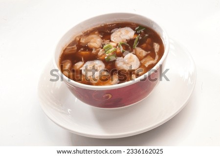 Mixed sea food soup. Is a popular Chinese-Japanese delicacy all over Japanese. Arabic, Chinese cuisine pictures, isolated on White background.