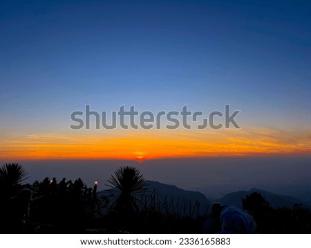 Sunrise at a mountain in Thailand. A lot of people were taking pictures of the sunrise.