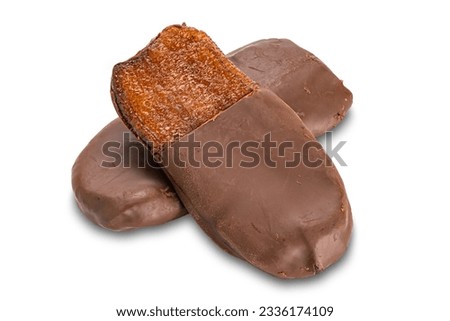High angle view pile of homemade chocolate dipped solar dried ripe flat banana isolated on white background with clipping path. Royalty-Free Stock Photo #2336174109