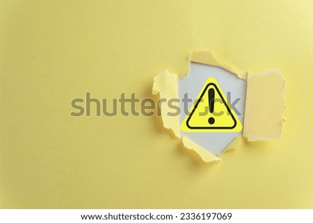 Exclamation mark or Warning sign in Breakthrough Yellow paper hole with white background perfect for attention symbol,Cautionary Warning,safety, hazard,,caution, danger.