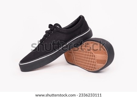 Men's classic black moccasins with a strong sports sole. Comfortable sports shoes made of fabric for every day