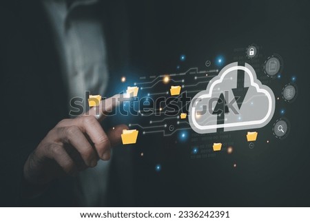 Business person migrate data and corporate information into cloud technology for data security and back up as disaster recovery site and prevent for cyber crime. Data inventory for enterprise. Royalty-Free Stock Photo #2336242391