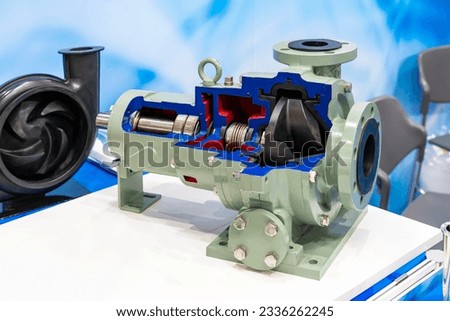 close up cross section sample impeller and other detail inside volute chamber housing frame plate liner etc. of centrifugal pump for water or liquid conveying in industrial Royalty-Free Stock Photo #2336262245